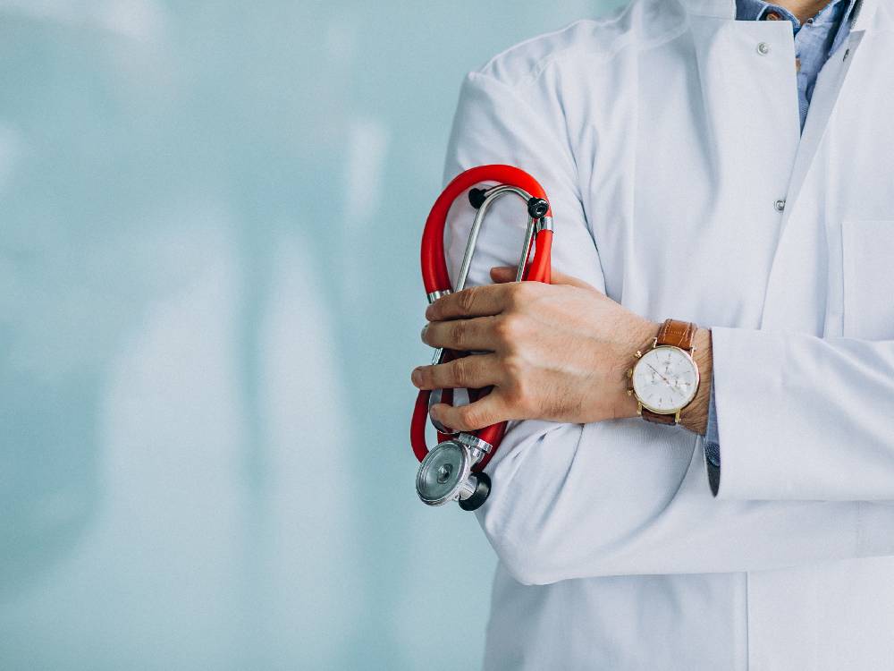 Doctor consulting patient at Pure Health Nourish